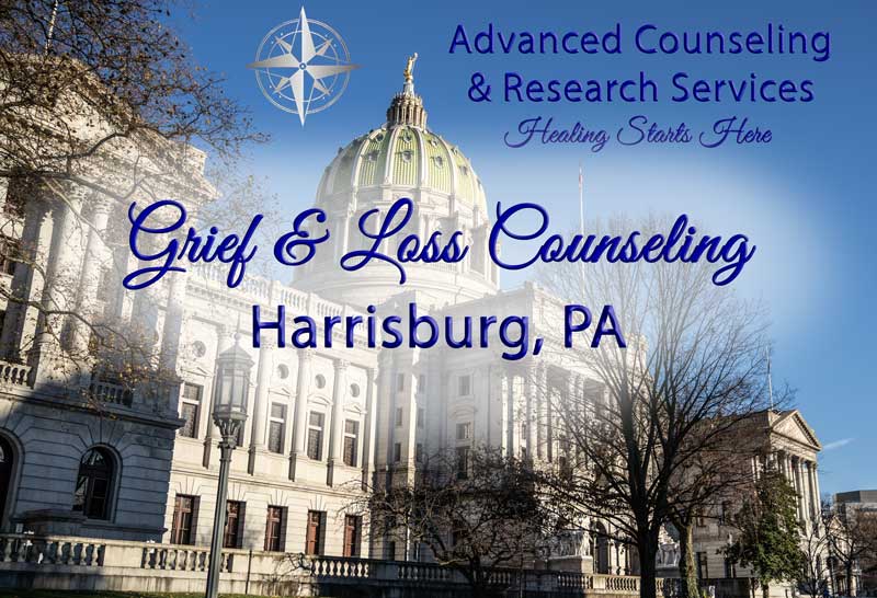 Serene Pennsylvania countryside path at golden hour symbolizing the journey through grief toward healing for Harrisburg, PA residents