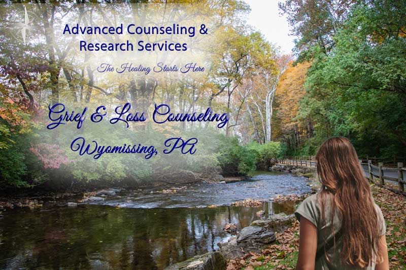 Serene Pennsylvania countryside path at golden hour symbolizing the journey through grief toward healing for Wyomissing, PA residents